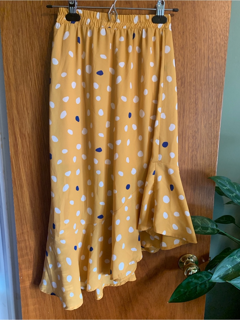 Polka Dot Asymmetrical Midi Skirt in Mustard Yellow